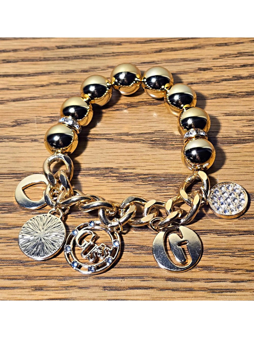 GUESS Gold Tone Charm Bracelet Rhinestone Logo Beaded Stretch Chain Jewelry